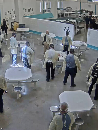 A screenshot of surveillance video taken shortly before men detained at the Torrance County were pepper-sprayed for engaging in a peaceful hunger strike