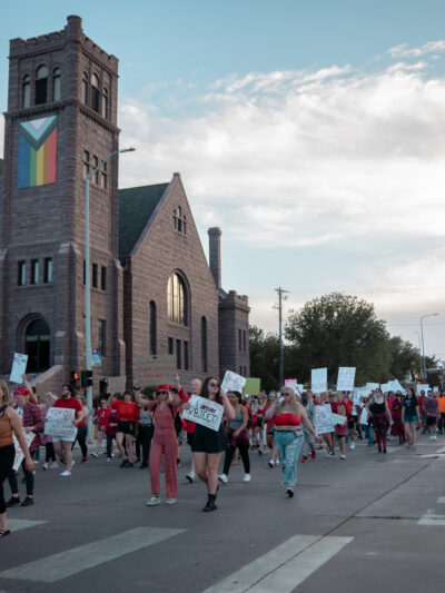 Image of people protesting down a street