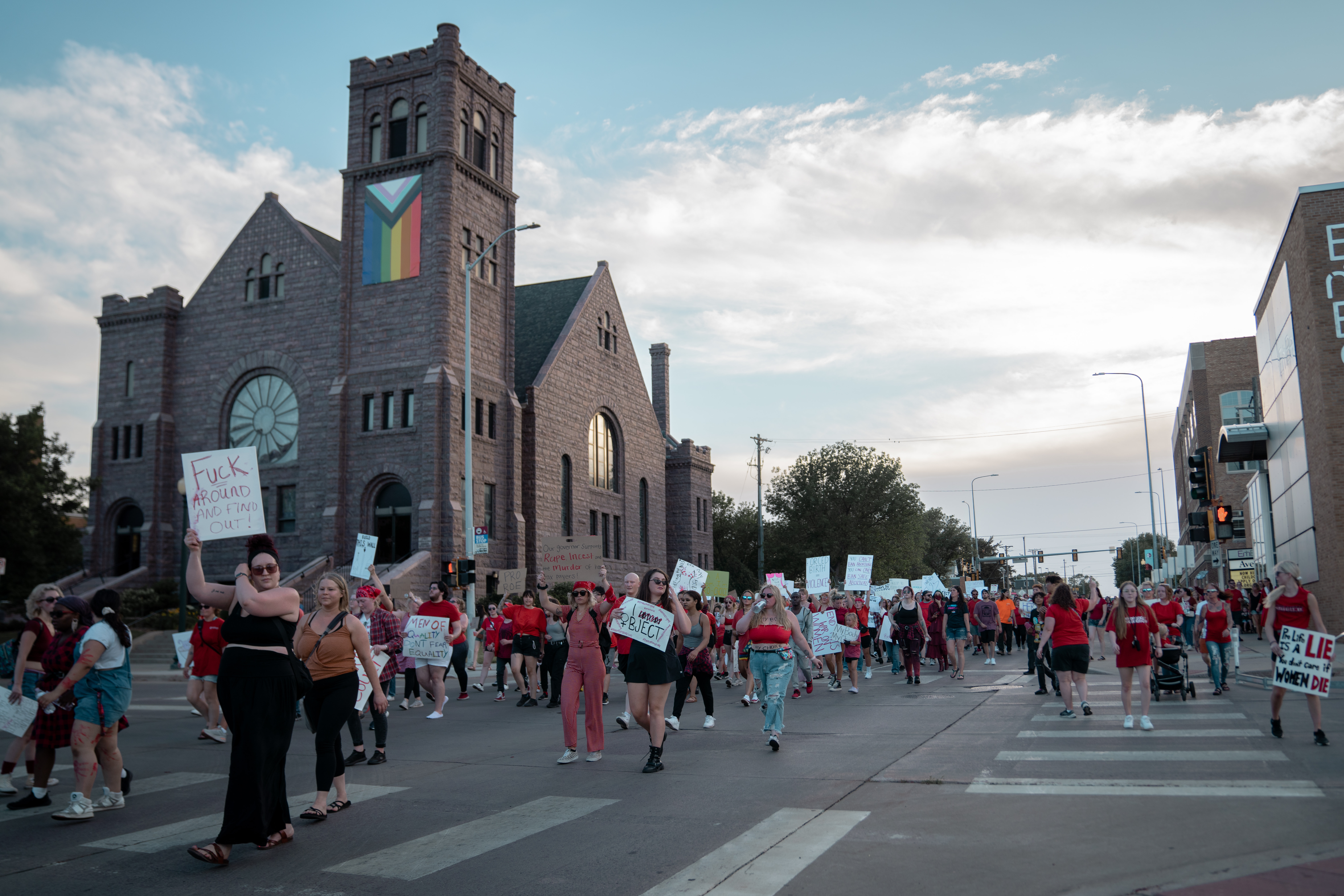 Image of people protesting down a street