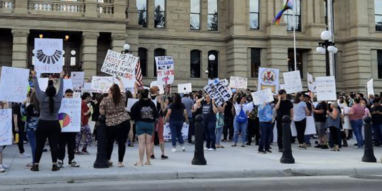image of people protesting at the capitol in Cheyenne