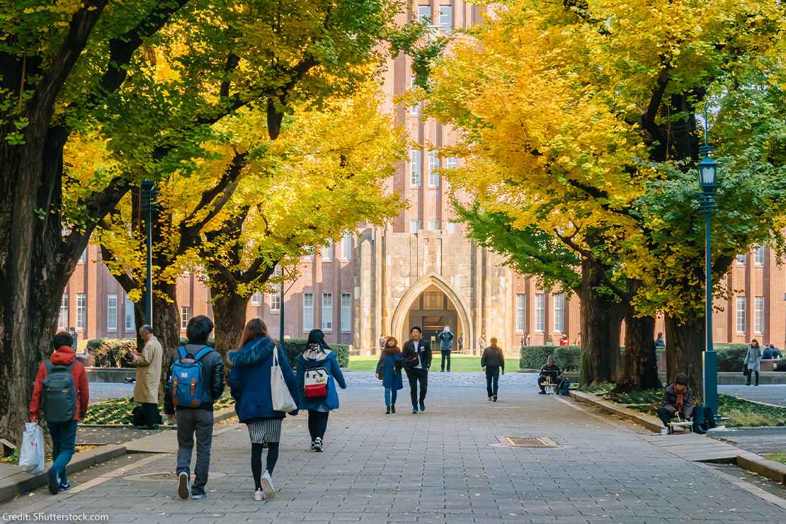 Students walking on a college campus.