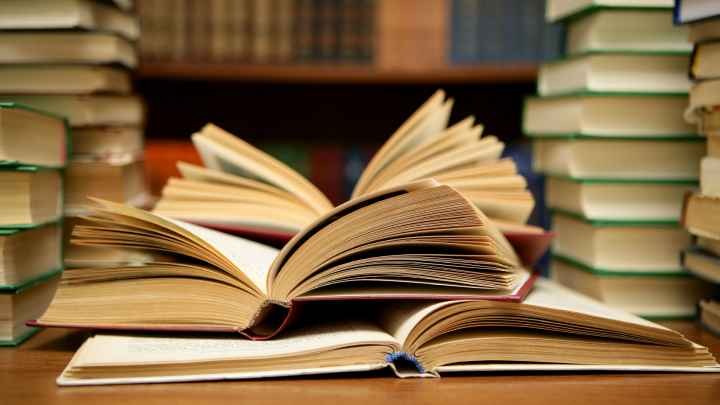 An open book on a table An open book on a table
