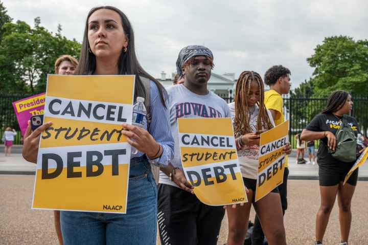 People protesting for student loan forgiveness. 