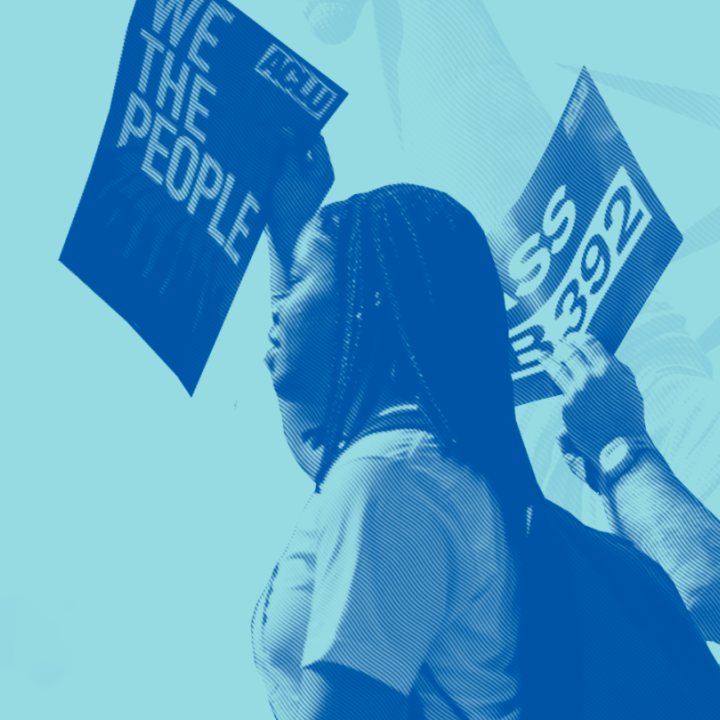 Image of two people at a protest placed over a blue background with the statue of liberty.  
