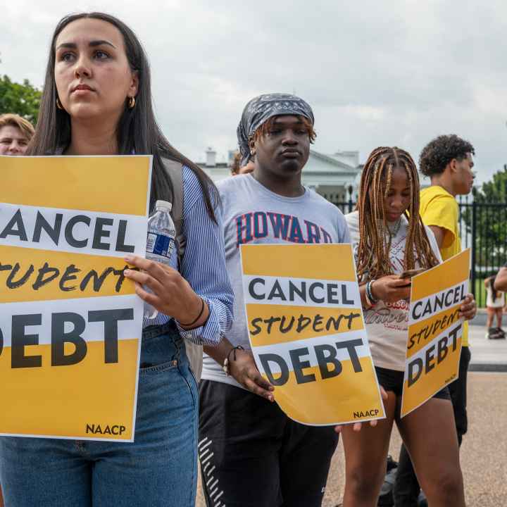 People protesting for student loan forgiveness. 